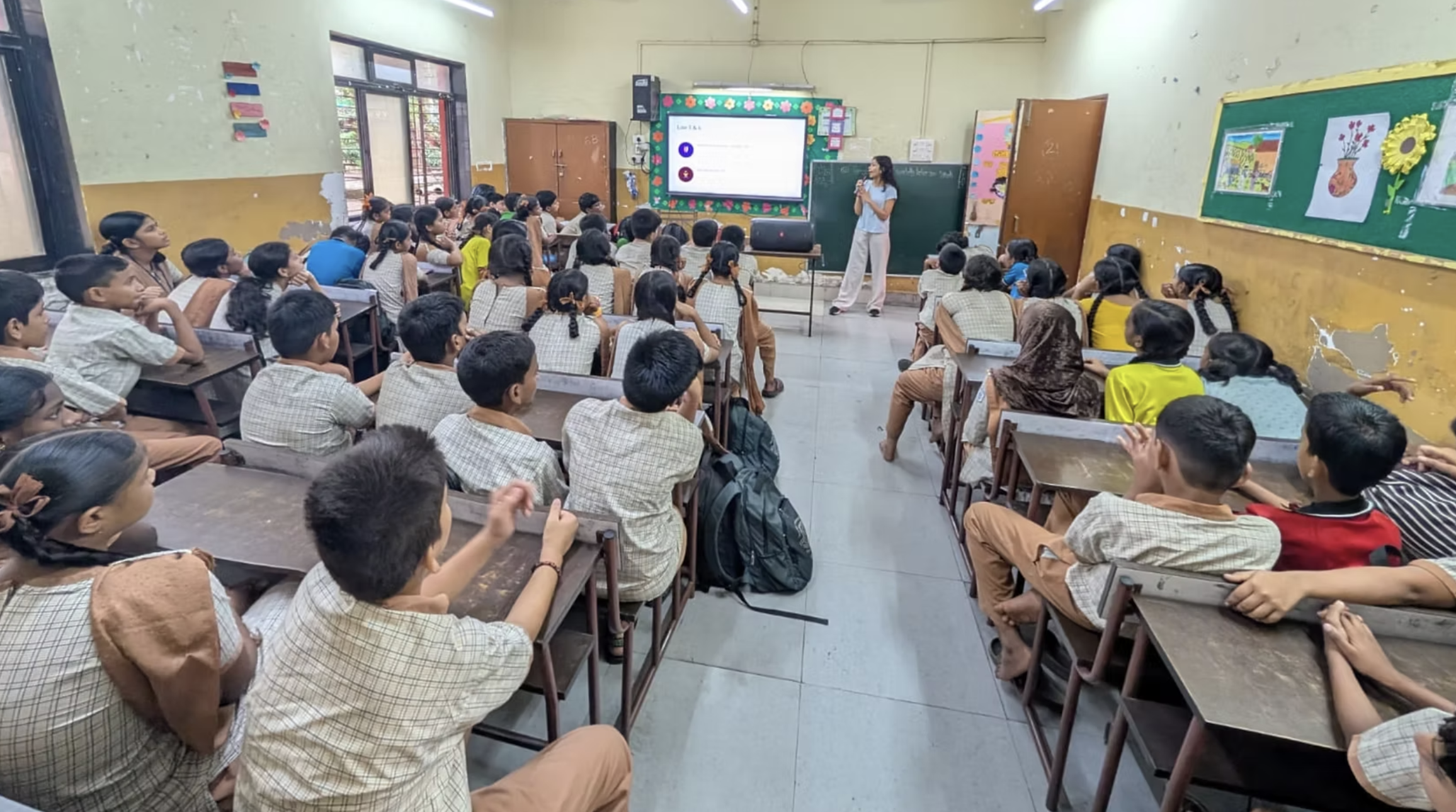 Children taking part in an interactive classroom session