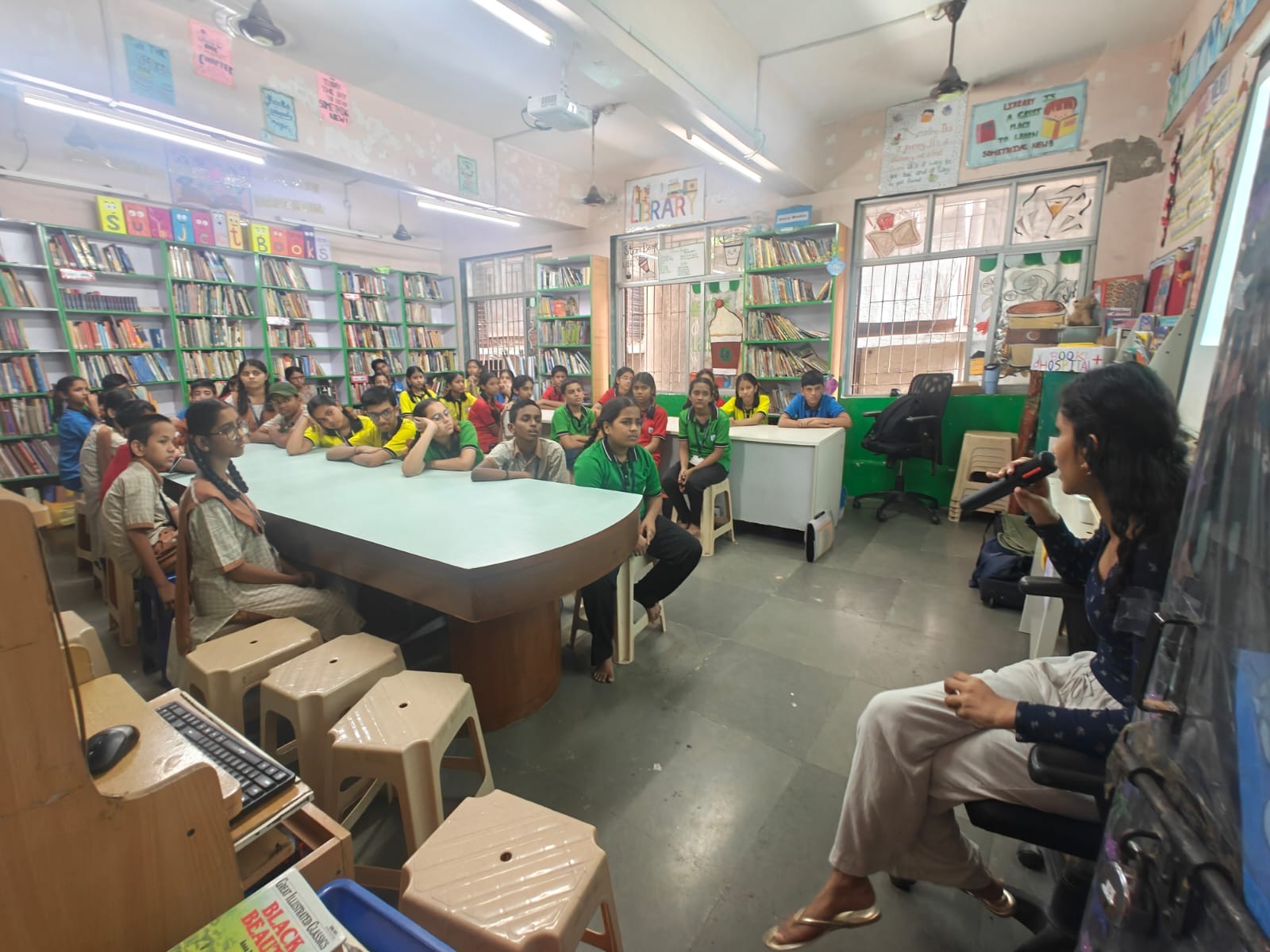 Children gathered for a learning session in a school library